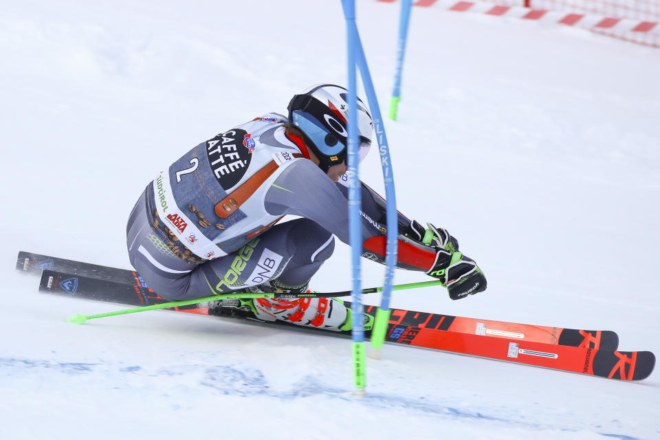 Norway's Henrik Kristoffersen speeds down the course during a men's World Cup Giant Slalom, in Alta Badia, Italy, Sunday, Dec. 16, 2018. (AP Photo/Alessandro Trovati)