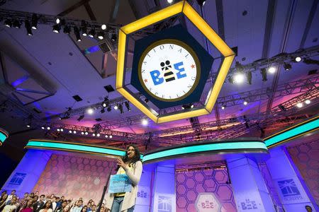 Snehaa Ganesh Kumar of Folsom, California, spells "Hippocrene" during the final round of the 88th annual Scripps National Spelling Bee at National Harbor, Maryland May 28, 2015. REUTERS/Joshua Roberts