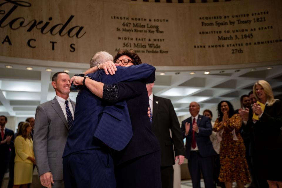 Speaker of the House Paul Renner and Senate President Kathleen Passidomo hug one another in the fourth floor rotunda at the close of the 2023 Florida legislative session Friday, May 5, 2023. 