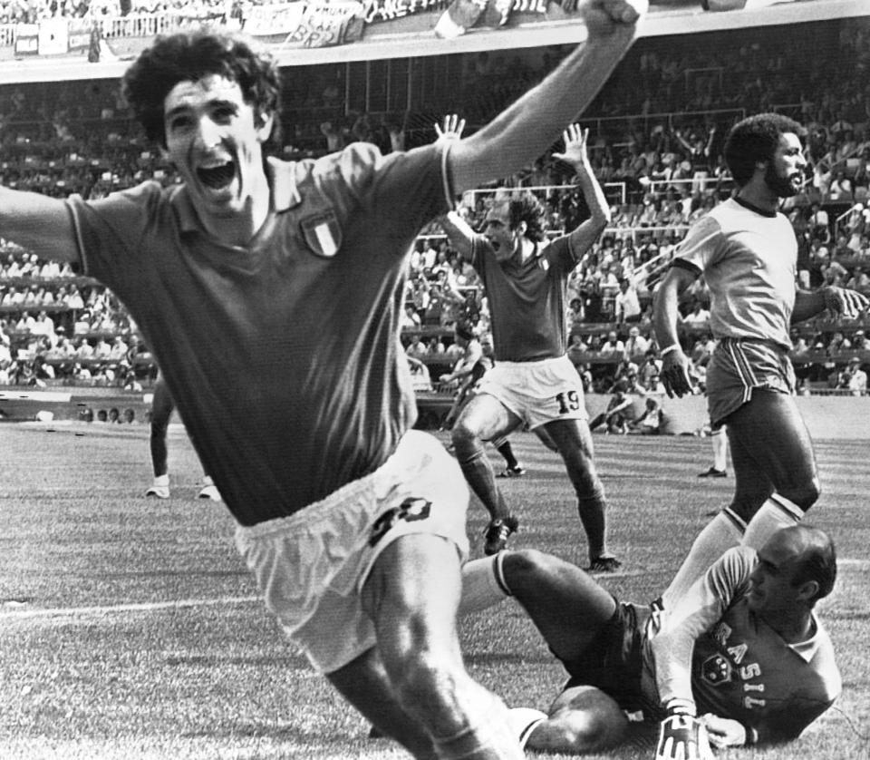 FILE - Italy's Paolo Rossi celebrates, after scoring the second goal for his team during their World Cup match second round soccer match against Brazil, in Barcelona, Spain on July 5, 1982. Italy, who beat Brazil 3-2 in a classic match, went on to win the tournament with Rossi scoring six goals. (AP Photo/File)