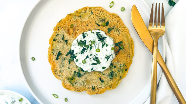 savory pancake with white topping