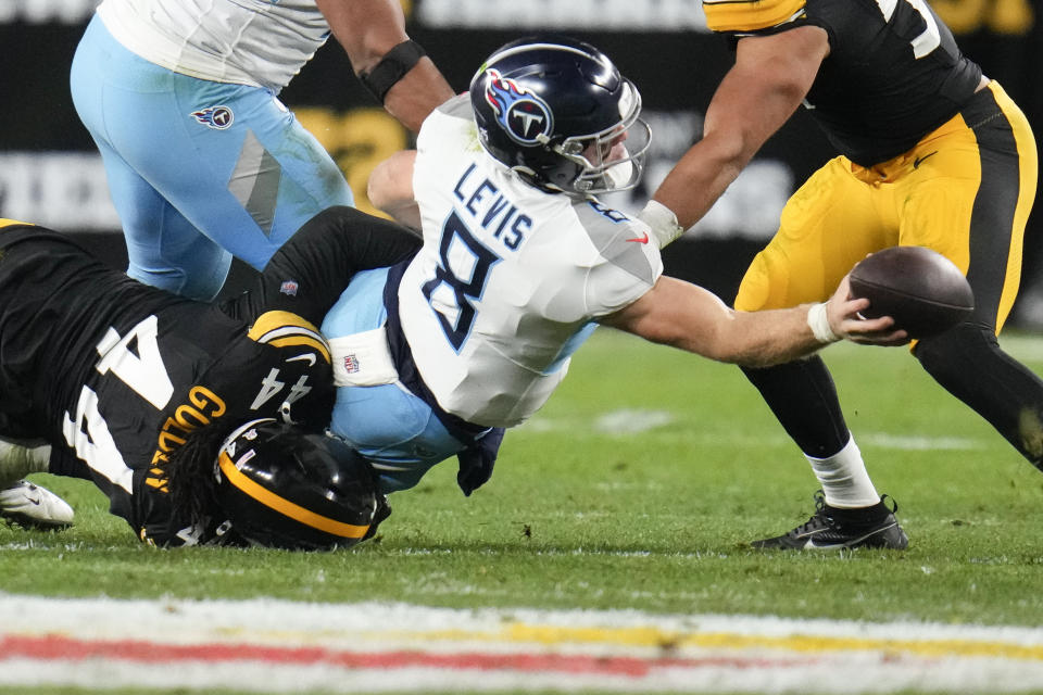 Tennessee Titans quarterback Will Levis (8) throws the ball as he is sacked by Pittsburgh Steelers linebacker Markus Golden (44) during the first half of an NFL football game Thursday, Nov. 2, 2023, in Pittsburgh. (AP Photo/Gene J. Puskar)