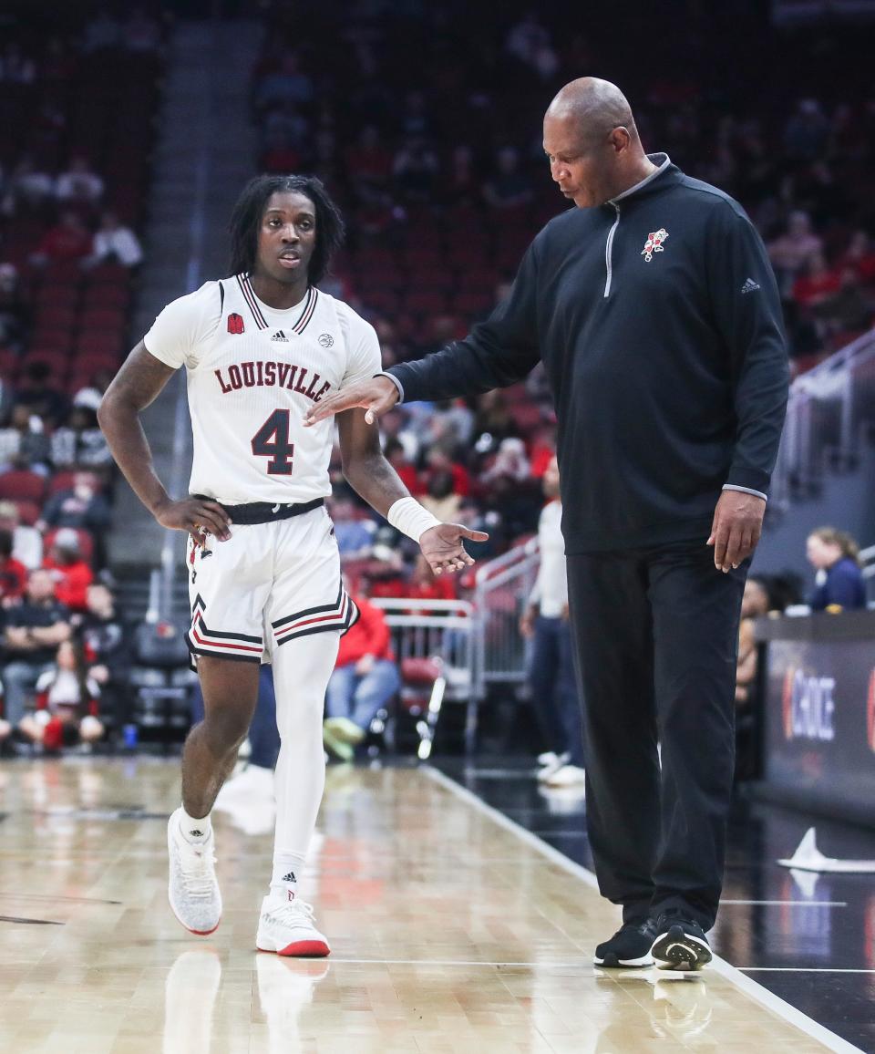 U of L coach Kenny Payne gives encouragement to guard Ty-Laur Johnson in the second half. The Cards defeated Coppin State, 61-41, on Wednesday night.