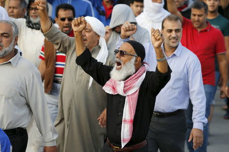 A protester shouts anti-Saudi slogans as he takes part in a protest against the execution of Saudi Shi'ite cleric Nimr al-Nimr by Saudi authorities, in the village of Sanabis, west of Manama, Bahrain January 2, 2016. REUTERS/Hamad I Mohammed