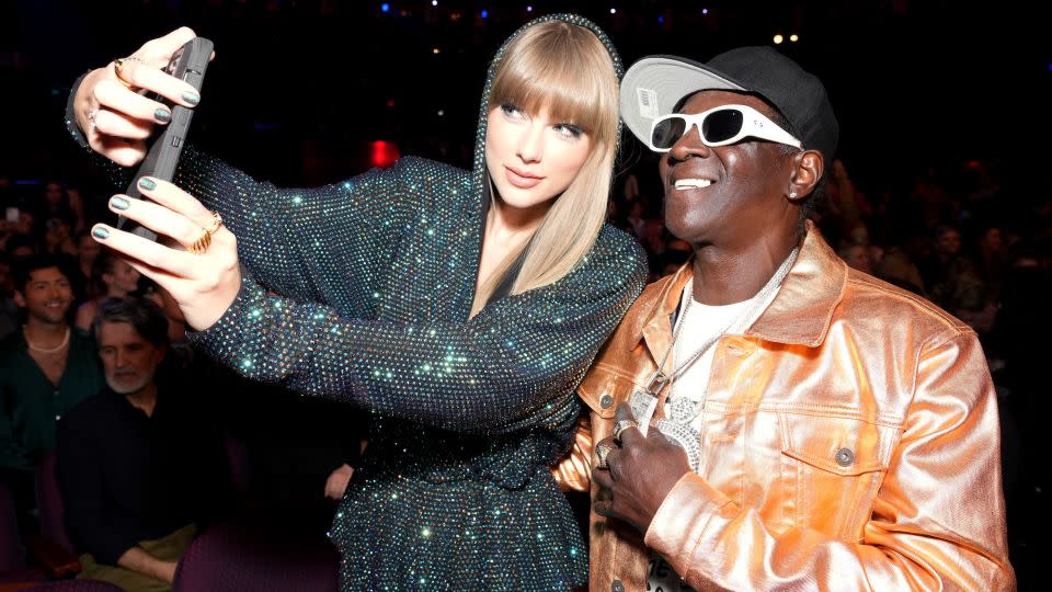 Taylor Swift and Flavor Flav attend the 2023 iHeartRadio Music Awards at Dolby Theatre in Los Angeles, California on March 27, 2023. - Kevin Mazur/Getty Images for iHeartRadio