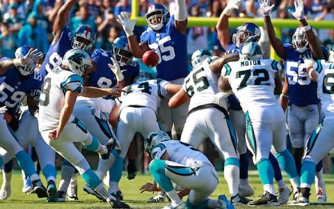 Carolina Panthers' Graham Gano (9) kicks the game-winning field goal against the New York Giants in the second half of an NFL football game in Charlotte - Credit: (AP Photo/Jason E. Miczek)