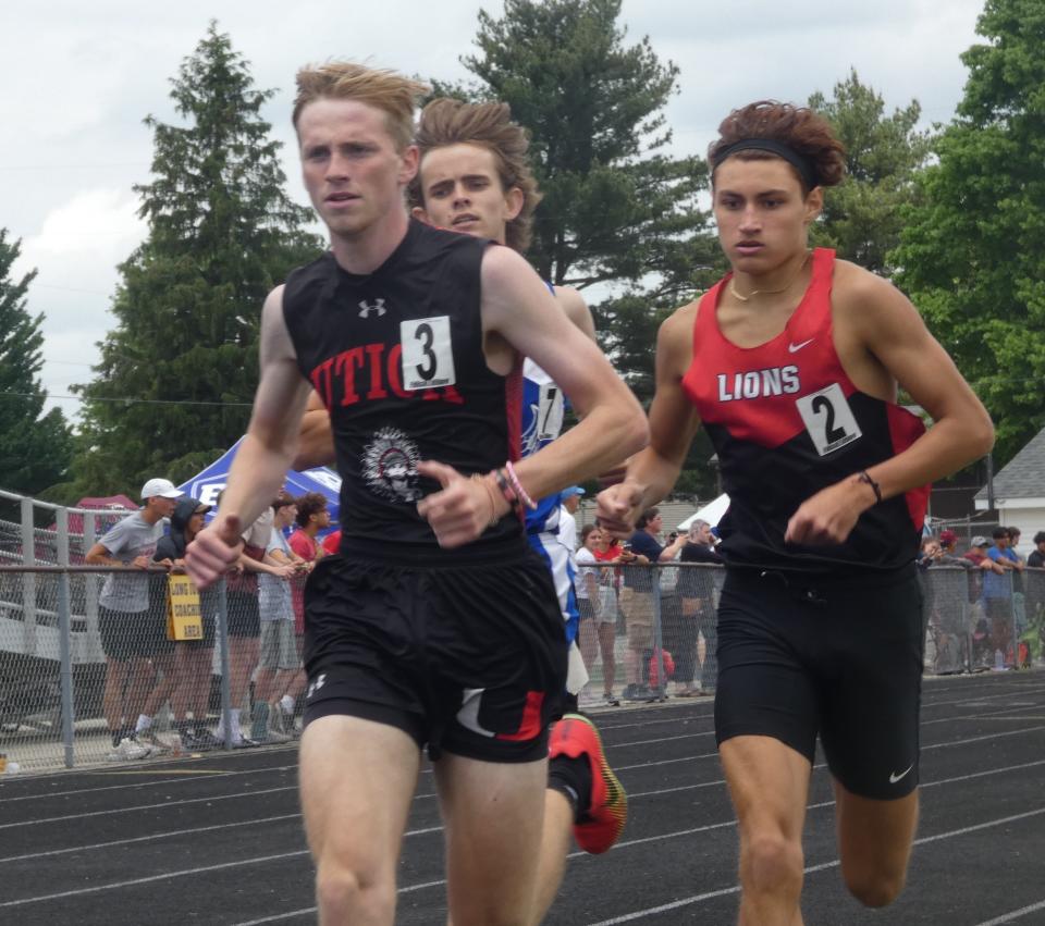 Utica senior Jay Figgins races in the 1,600 during the Division II regional championships at Lexington on Saturday, May 28, 2022. Figgins ran a time of 4:23.50 to reset his school record, win the event and qualify for state.