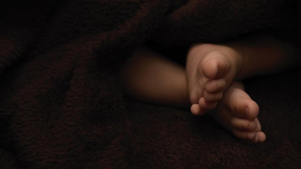 El pie de un recién nacido.