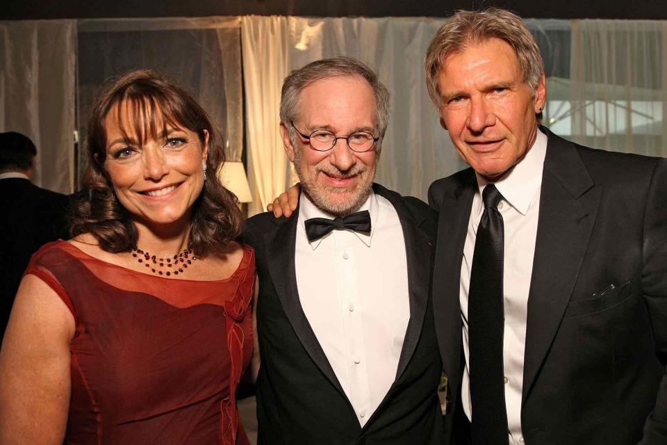 <p>Kristian Dowling/Getty</p> Actress Karen Allen, Director Steven Spielberg and actor Harrison Ford