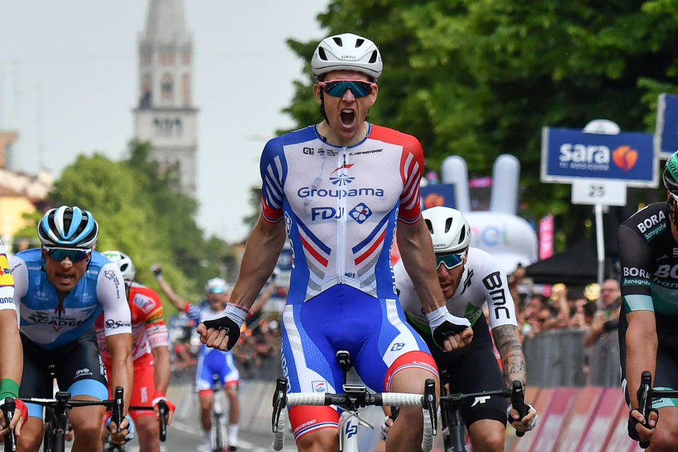 France's Arnaud Demare celebrates after crossing the finish line to win the 10th stage of the Giro d'Italia cycling race from Ravenna to Modena, Italy, Tuesday, May 21, 2019. (Alessandro Di Meo/ANSA via AP)