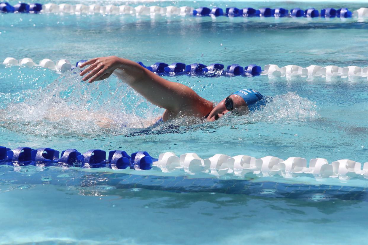 Aberdeen's Gena Jorgenson swims during the Summer High Point Swim Meet Friday at the Aberdeen Aquatic Center. She won seven individual races and was a part of two winning relays.