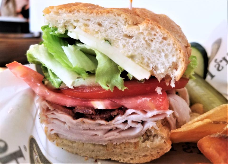 The BradenTurkey (turkey, bacon, cheddar, baby greens, tomato, cucumber, pesto aioli) is one of the signature sandwiches at Michelle’s Brown Bag Cafe (1819 Main St. in the Sarasota City Center). [HERALD-TRIBUNE STAFF PHOTO / WADE TATANGELO]