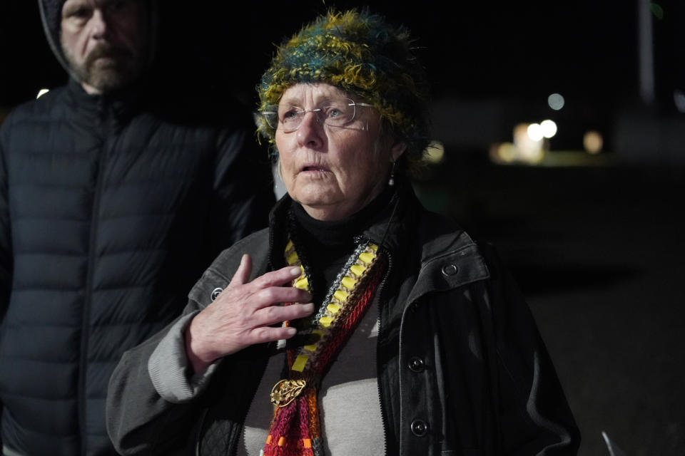 Death penalty opponent Rev. SallyFran Ross, speaks during a vigil for Thomas Edwin Loden Jr., outside the Mississippi State Penitentiary, in Parchman, Miss., Wednesday evening, Dec. 14, 2022. Loden, who pleaded guilty to raping and killing a 16-year-old girl, was put to death by lethal injection on Wednesday, becoming the second inmate executed in the state in 10 years. (AP Photo/Rogelio V. Solis)