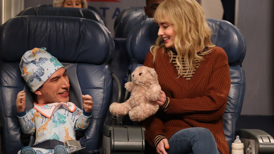 (From left) Adam Driver and Sarah Sherman in the 'Airplane Baby' sketch on 'SNL' in December. - WIll Heath/NBC