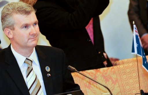 Australian government has halted the approval process for a huge Aus$6.4 billion coal mine owned by Indian infrastructure giant GVK and the world's richest woman Gina Rinehart. Federal Environment Minister Tony Burke (pictured in 2009) said he would not give the go-ahead until environmental concerns relating to run-off from the mine impacting the Great Barrier Reef were properly addressed