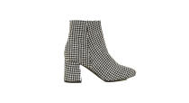 <p>Season after season, houndstooth returns as an autumn go-to so why not bag a pair of block heel boots in the retro print from New Look? <em><a rel="nofollow noopener" href="https://www.newlook.com/uk/womens/footwear/boots/wide-fit-black-houndstooth-flared-heel-boots-/p/591078509?comp=Browse" target="_blank" data-ylk="slk:Shop now;elm:context_link;itc:0;sec:content-canvas" class="link ">Shop now</a>.</em> </p>
