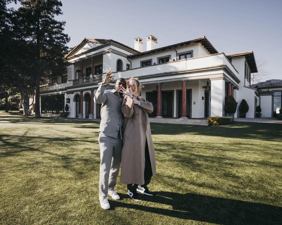 Adele shared a photo of herself and Rich Paul outside their new home in Beverly Hills earlier this year (Adele)