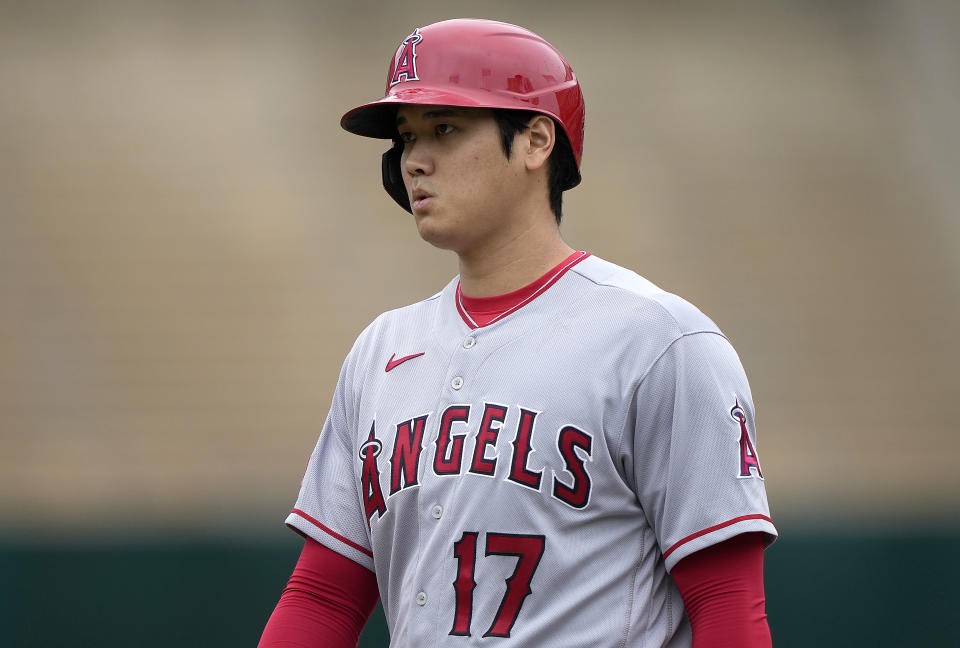 OAKLAND, CALIFORNIA - SEPTEMBER 02: Shohei Ohtani #17 of the Los Angeles Angels looks on while standing on first base after drawing a walk against the Oakland Athletics in the top of the first inning at RingCentral Coliseum on September 02, 2023 in Oakland, California. (Photo by Thearon W. Henderson/Getty Images)