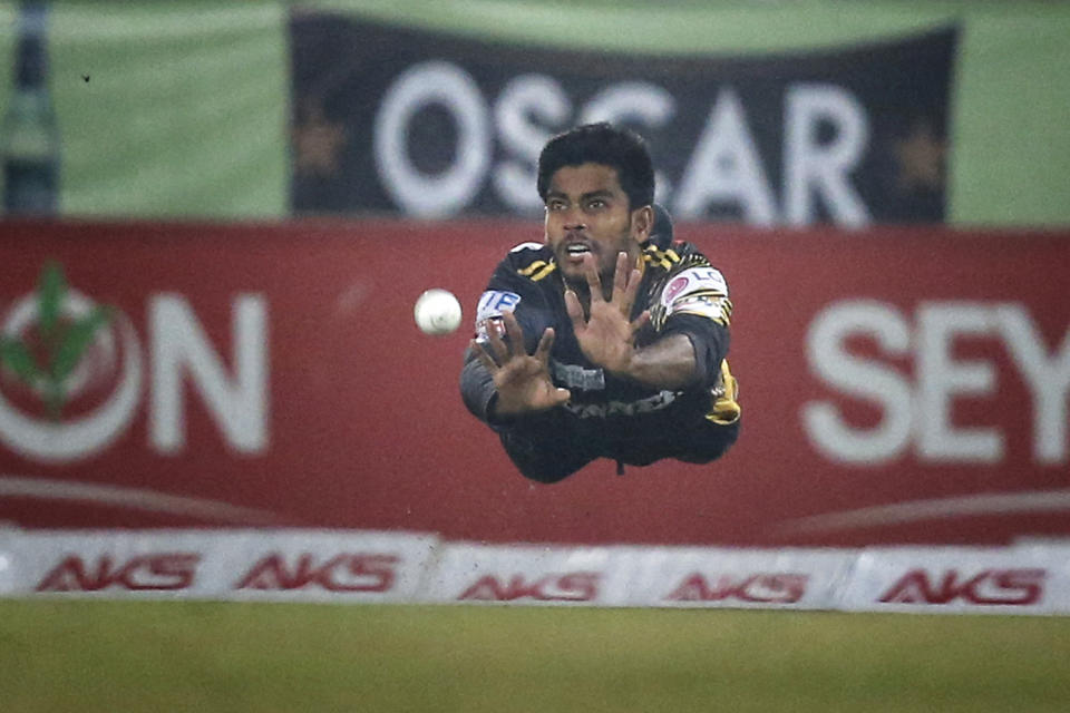 Hasan Miraz dives to make a catch