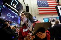 Traders work on the floor of the NYSE in New York