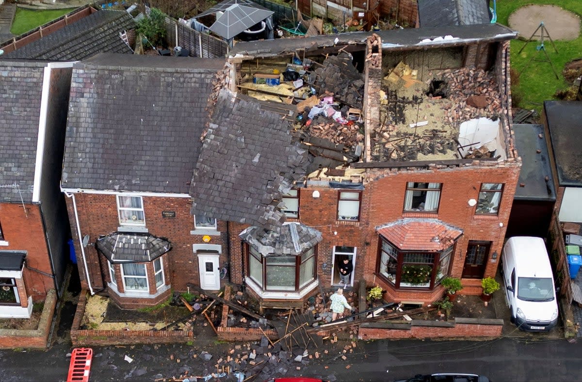 Damage on the roofs of a row of terraced houses after Storm Gerrit hit Stalybridge (REUTERS)