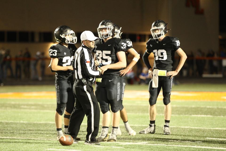 Water Valley High School defensive lineman Kyle Banister (35) asks a question of an official during a Class 1A Division I football state quarterfinal game Saturday, Nov. 27, 2021, at Griffith Stadium in Robert Lee.