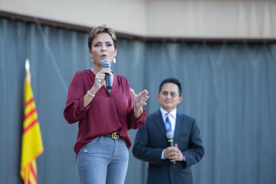 Republican candidate for Arizona governor Kari Lake and Kevin Dang, president of the Vietnamese Community of Arizona, speak at the Mid-Autumn Moon Festival in Glendale on Saturday, Sept. 17, 2022.
