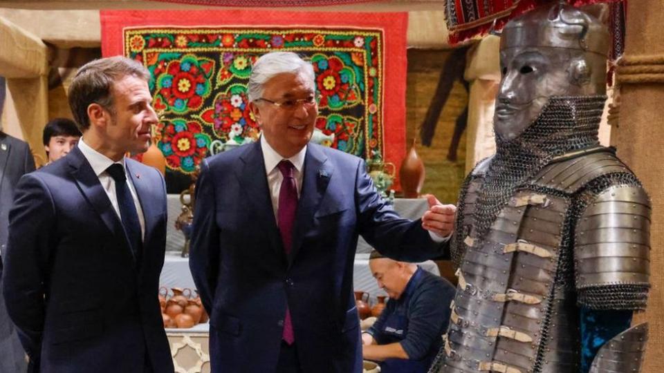 France's President Emmanuel Macron (2ndL) and Kazakhstan's President Kassym-Jomart Tokayev (R) visit an exhibition of Kazakhstan's culture and traditions in Astana on November 1, 2023