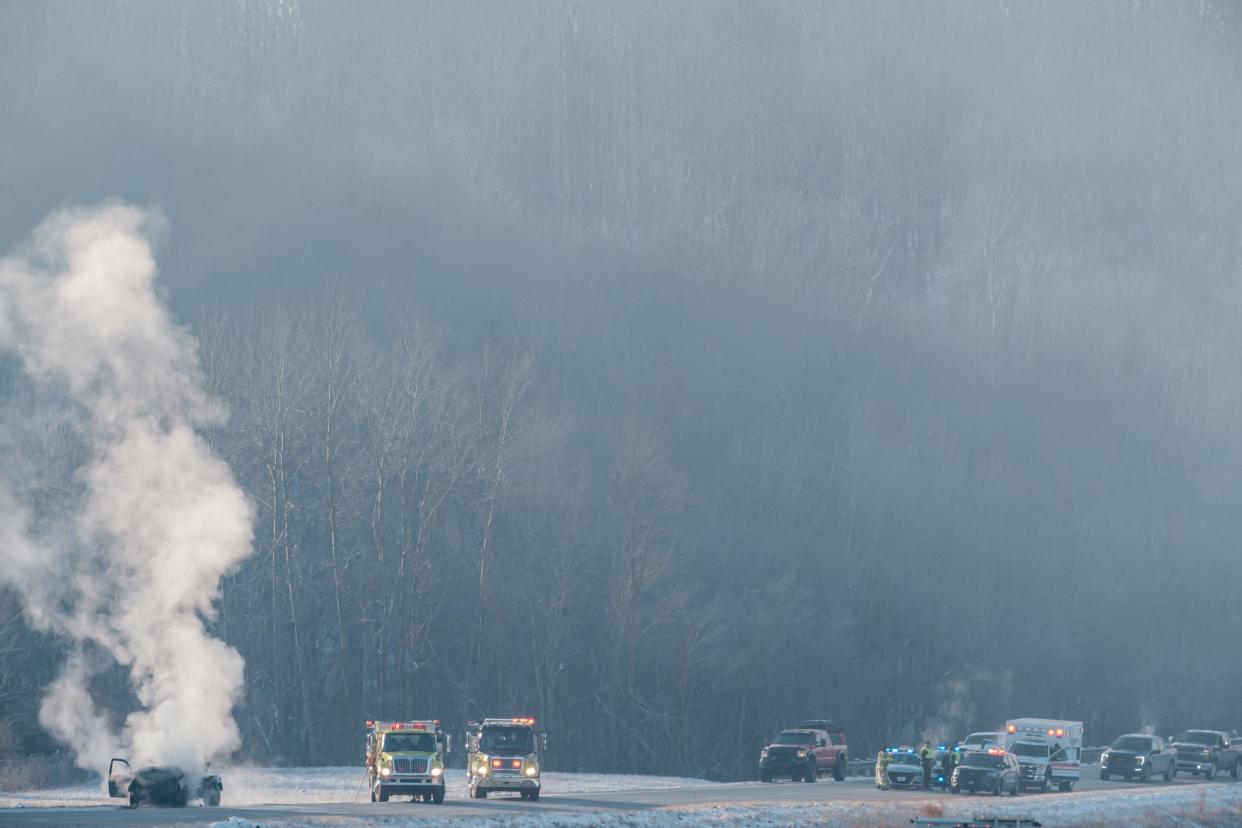 Delaware Valley Joint Fire District firefighters extinguish a truck fire that temporarily closed northbound lanes of Interstate 77 in Salem Township on Wednesday morning.