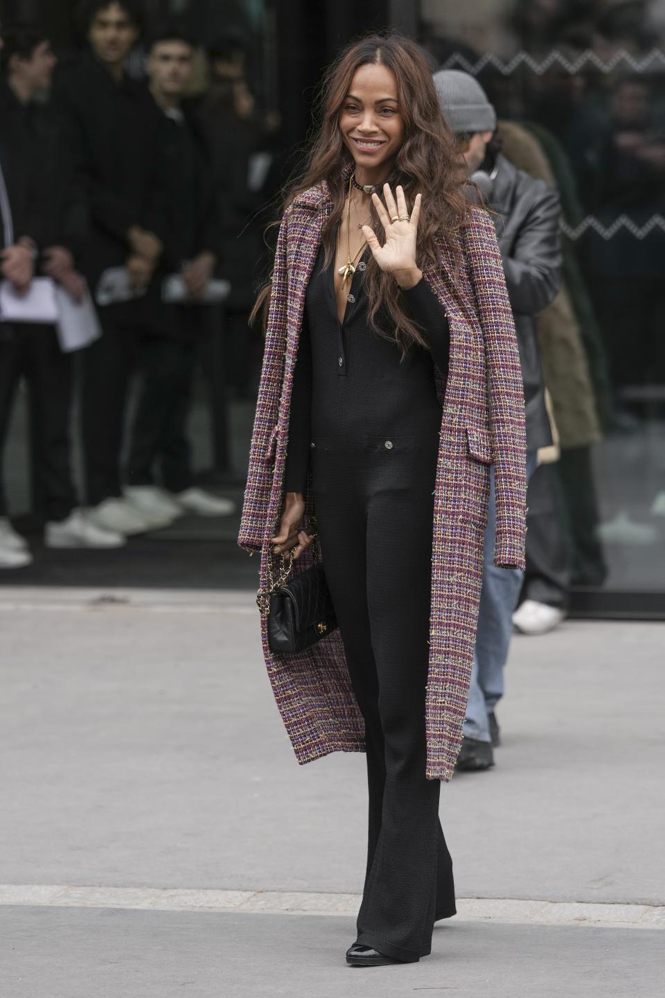 Zoe Saldana attends the Chanel Fall/Winter 2023-2024 ready-to-wear collection presented Tuesday, March 7, 2023 in Paris. (Scott Garfitt/Invision/AP)