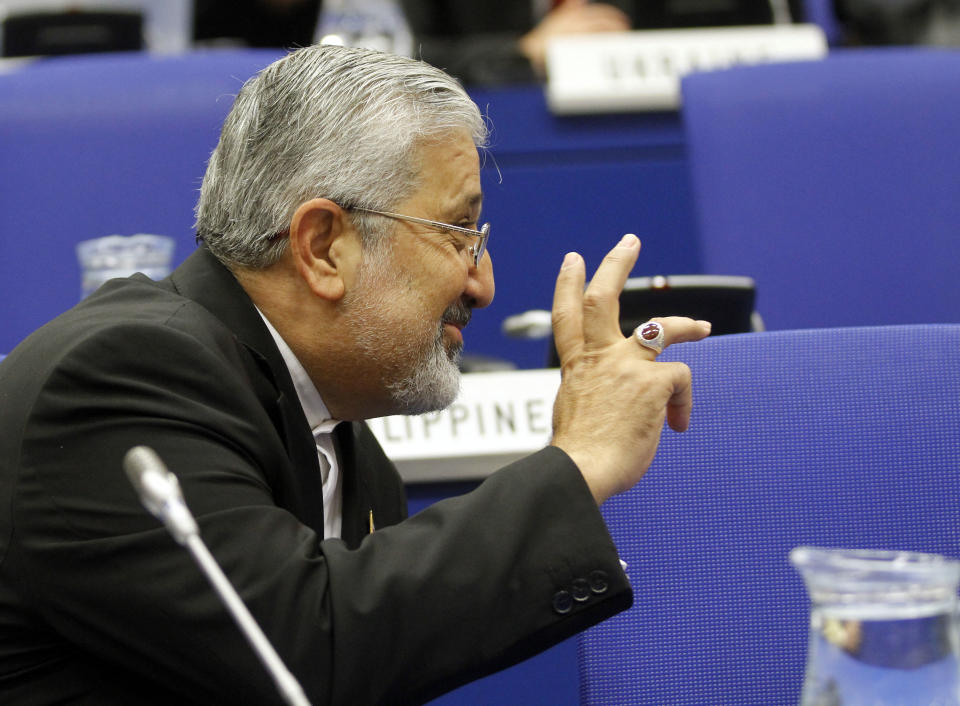 Iran's Ambassador to the International Atomic Energy Agency, IAEA, Ali Asghar Soltanieh speaks as he waits for the start of the IAEA board of governors meeting at the International Center, in Vienna, Austria, on Wednesday, June 6, 2012. (AP Photo/Ronald Zak)