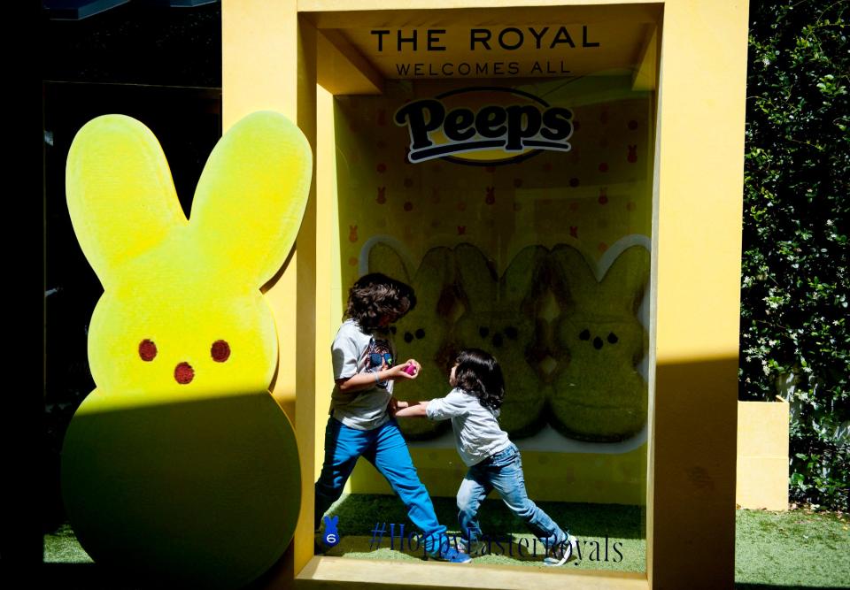 Children enjoy a Peeps photo booth during The Royal Poinciana Plaza's A Royal Easter Affair for the Little Peeps in April 2021.