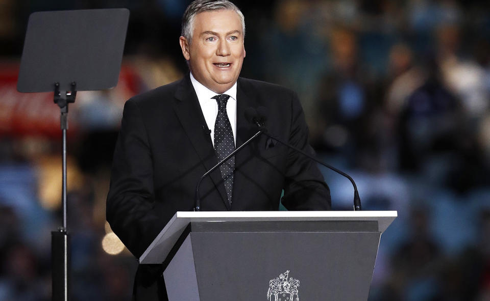 Eddie McGuire, pictured here speaking at Shane Warne's memorial service at the MCG.