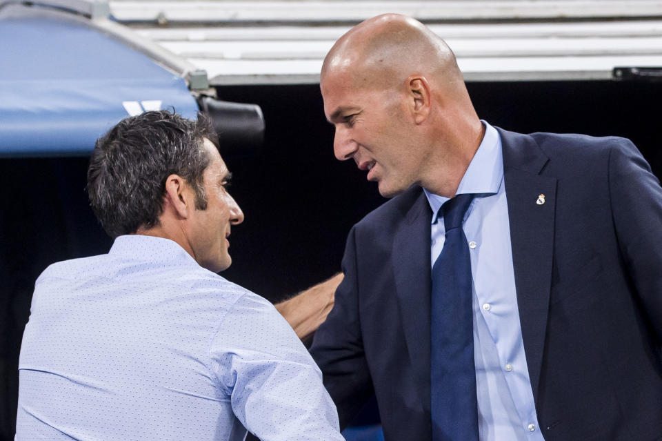 Both Barcelona manager Ernesto Valverde (left) and Real Madrid manager Zinedine Zidane wanted El Clasico to be played as scheduled. (Getty)