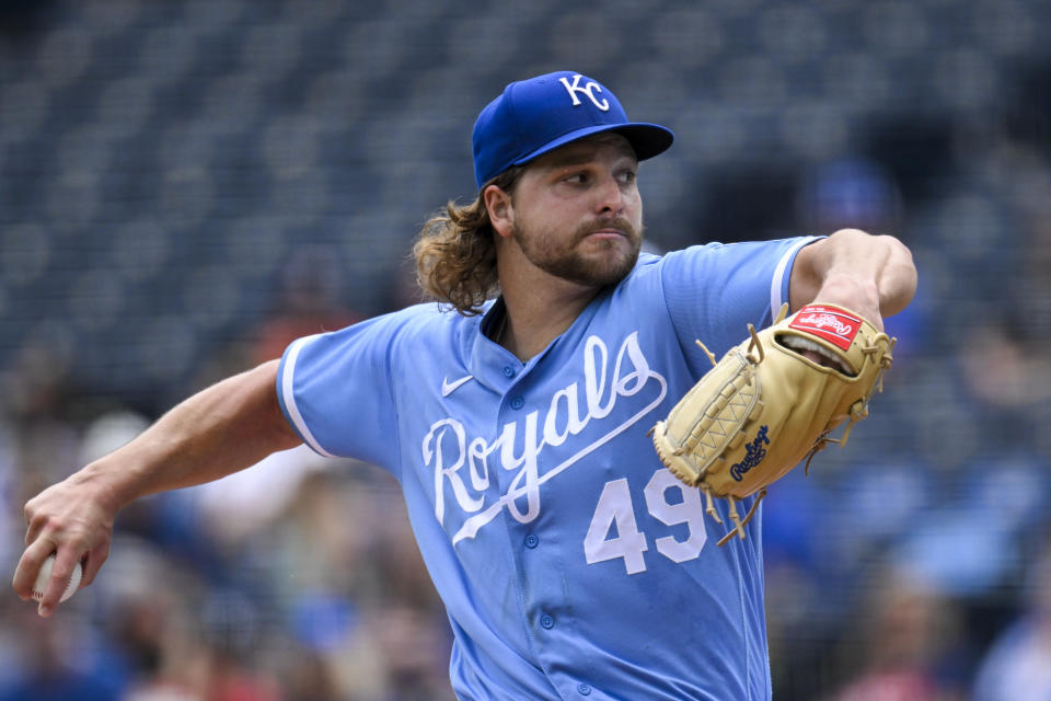 Kansas City Royals starting pitcher Jonathan Heasley throws during the first inning of a baseball game against the Houston Astros, Sunday, June 5, 2022, in Kansas City, Mo. (AP Photo/Reed Hoffmann)