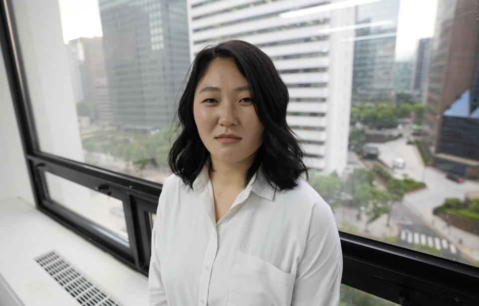 Film director Sun Hee Engelstoft poses for photograph after an interview in Seoul, South Korea on May 28, 2021. Bringing her camera to a home for unwed mothers on South Korea’s Jeju island, Engelstoft anticipated an empowering story about young women keeping their babies. She ended up with a raw and unsettling documentary about how a deeply conservative sexual culture, lax birth registration laws and a largely privatized adoption system continue to pressure and shame single mothers into relinquishing their children for adoption. (AP Photo/Lee Jin-man)