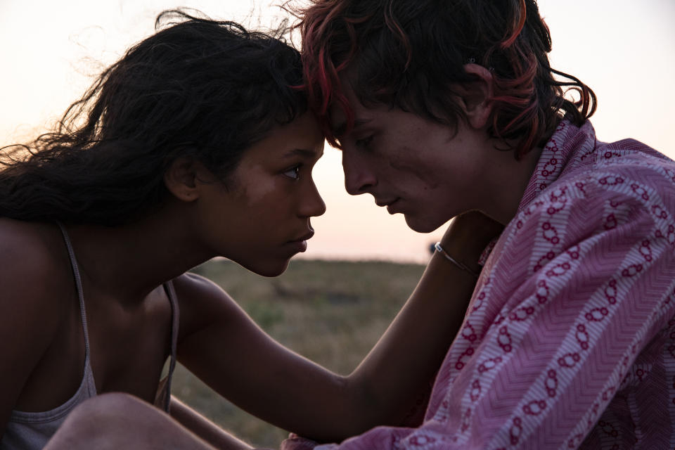 This image released by MGM Pictures shows Taylor Russell and Timothée Chalamet in a scene from "Bones and All." (Yannis Drakoulidis/Metro Goldwyn Mayer Pictures via AP)