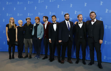 Cast members pose during a photocall to promote the movie Songwriter at the 68th Berlinale International Film Festival in Berlin, Germany, February 23, 2018. REUTERS/Fabrizio Bensch