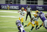 Green Bay Packers quarterback Aaron Rodgers (12| throws a pass during the first half of an NFL football game against the Minnesota Vikings, Sunday, Sept. 13, 2020, in Minneapolis. (AP Photo/Bruce Kluckhohn)