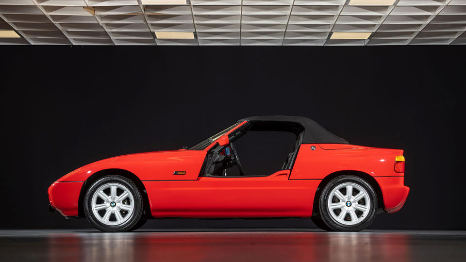 The 1990 BMW Z1 Roadster from the side with its doors down