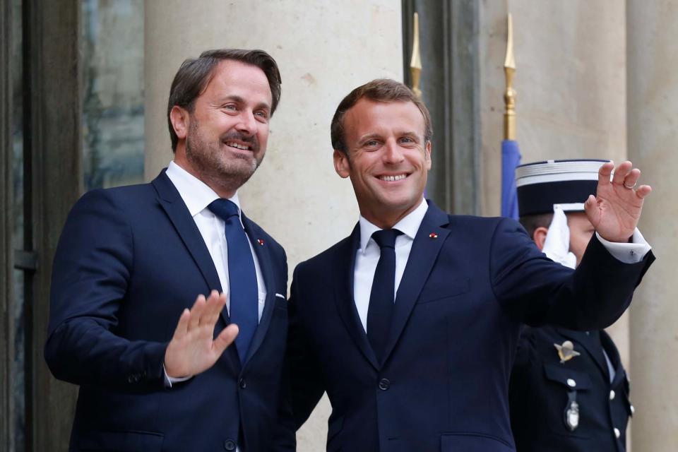 France's President Emmanuel Macron, right, welcomes Luxembourg's Prime Minister Xavier Bettel, prior to a meeting, at the Elysee Palace. (AP)