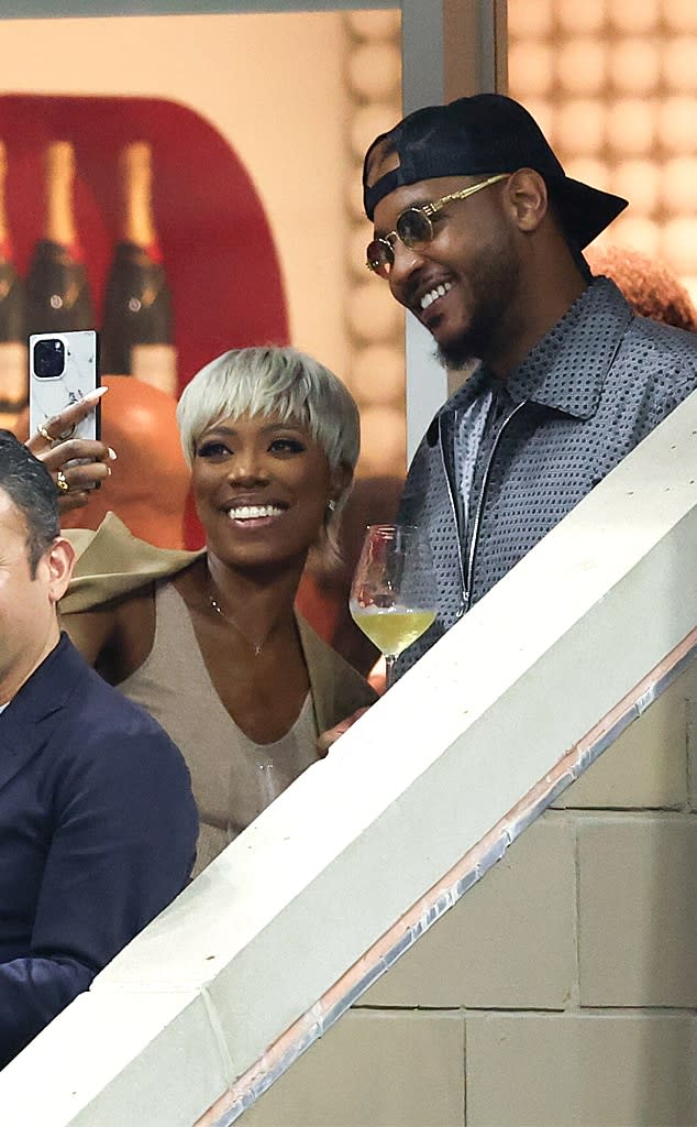 <p>Yvonne Orji & Carmelo Anthony</p>