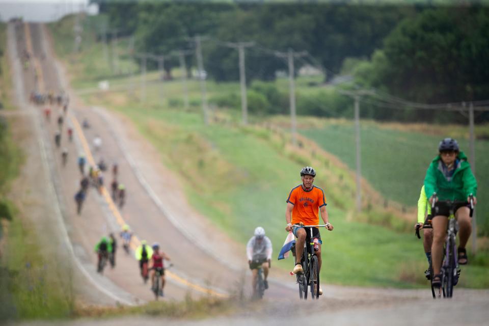 RAGBRAI riders roll into Minden on July 21, 2019, on their way to the overnight town of Atlantic.