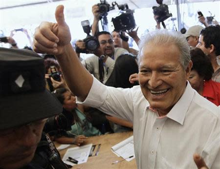 Salvador Sanchez Ceren, the presidential candidate for the Farabundo Marti Front for National Liberation (FMLN), gestures after casting his vote in a presidential election runoff in San Salvador March 9, 2014. REUTERS/Henry Romero