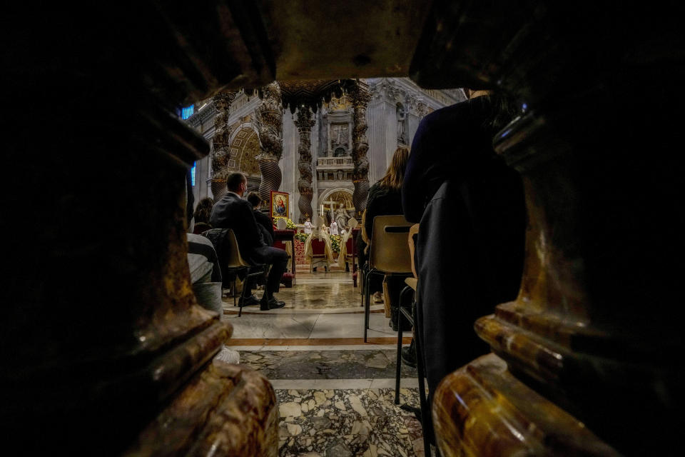 Pope Francis celebrates Mass on the occasion of the Christ the King festivity, in St. Peter's Basilica at the Vatican, Sunday, Nov. 21, 2021. (AP Photo/Andrew Medichini)