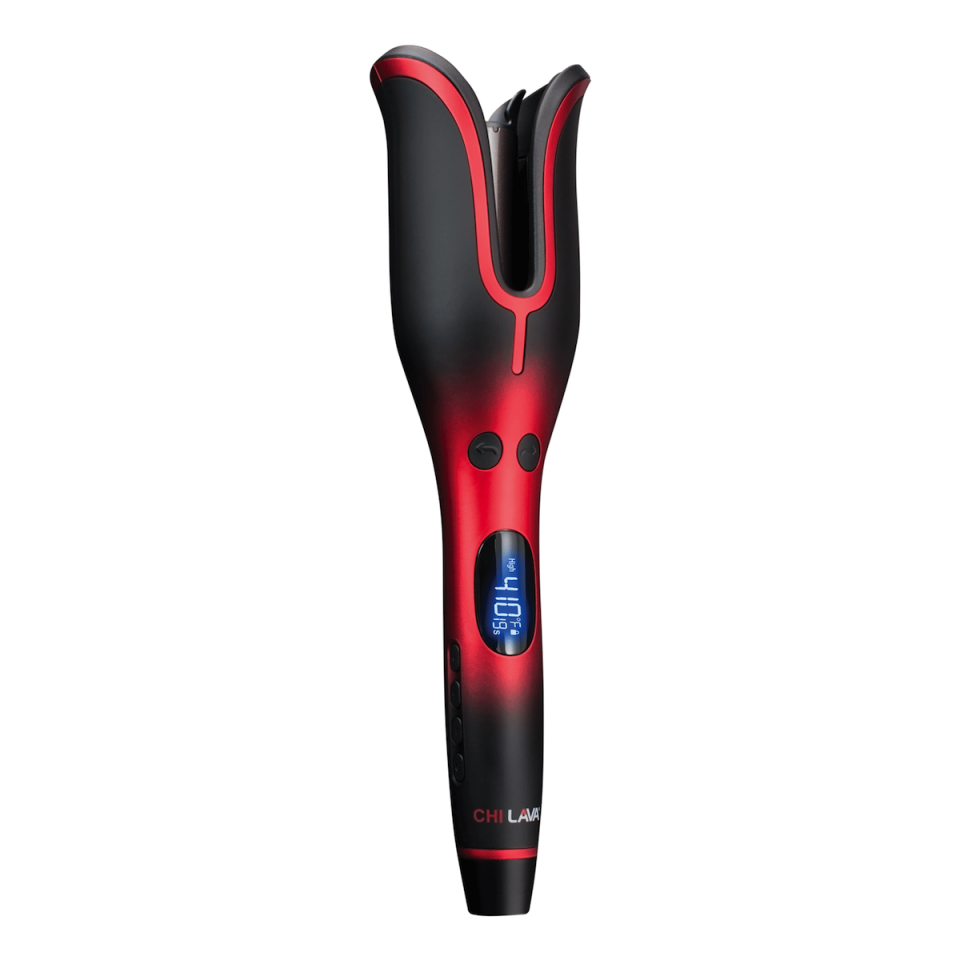 This thing looks intimidating as hell, but it's surprisingly easy to use. All you do is section your hair into one-inch pieces (smaller sections is key), feed it into the chamber, press a button, and—boom—curls. (<a href="https://www.glamour.com/story/chi-rotating-curling-iron-review?mbid=synd_yahoo_rss" rel="nofollow noopener" target="_blank" data-ylk="slk:See it how it works, here" class="link ">See it how it works, here</a>.) It's a little heavy and clunky-looking, but the design is great if you're someone who always burns yourself, since the outside chamber stays cool. The lasting results were what really sold me, though. I purposefully tested the iron right before bed to see how the curls would match up against a night of sleep. The next morning I woke up to see that my hair still had modern, thick waves. <em>—Halie LeSavage, contributor</em> $130, Chi. <a href="https://shop-links.co/1670703855713607211" rel="nofollow noopener" target="_blank" data-ylk="slk:Get it now!" class="link ">Get it now!</a>