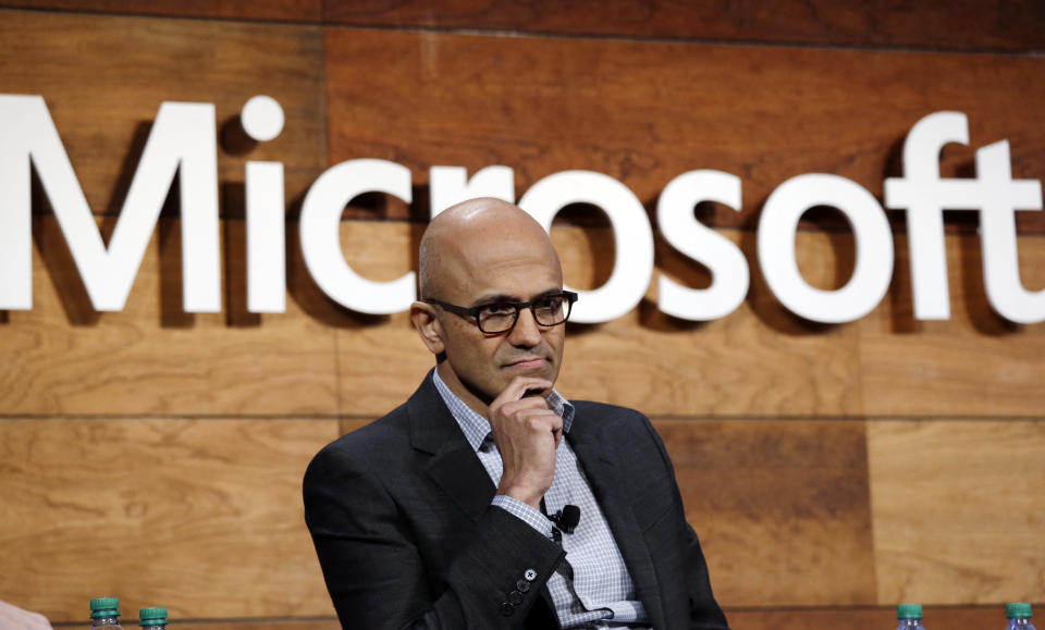 Microsoft CEO Satya Nadella listens to a question at the annual Microsoft shareholders meeting Wednesday, Nov. 30, 2016, in Bellevue, Wash. (AP Photo/Elaine Thompson)