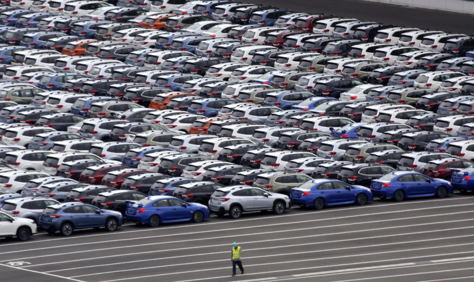 In this July 8, 2019, photo, cars for export are parked at Kawasaki port, near of Tokyo. Japan has logged a third straight month of a trade deficit in September, according to the latest government data, as trade tensions between China and the U.S. crimped exports. Japan’s Finance Ministry reported Monday, Oct. 21, the nation’s trade deficit in September totaled 122.98 billion yen ($1.13 billion). (AP Photo/Koji Sasahara)