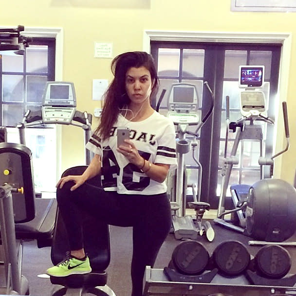 "Back at it," Kardashian posted along with this makeup-free snapshot taken in her gym in January 2014, six months after giving birth to daughter Penelope.