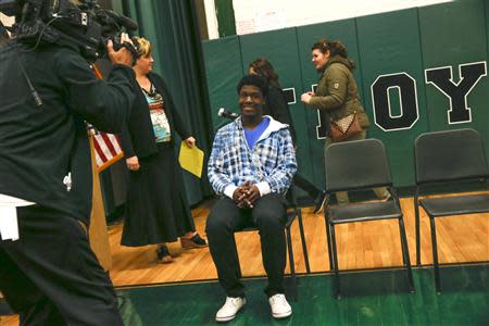 Kwasi Enin, a high school senior, sits before announcing he will attend Yale University during a press conference at William Floyd High School in Mastic Beach, New York April 30, 2014. REUTERS/Shannon Stapleton